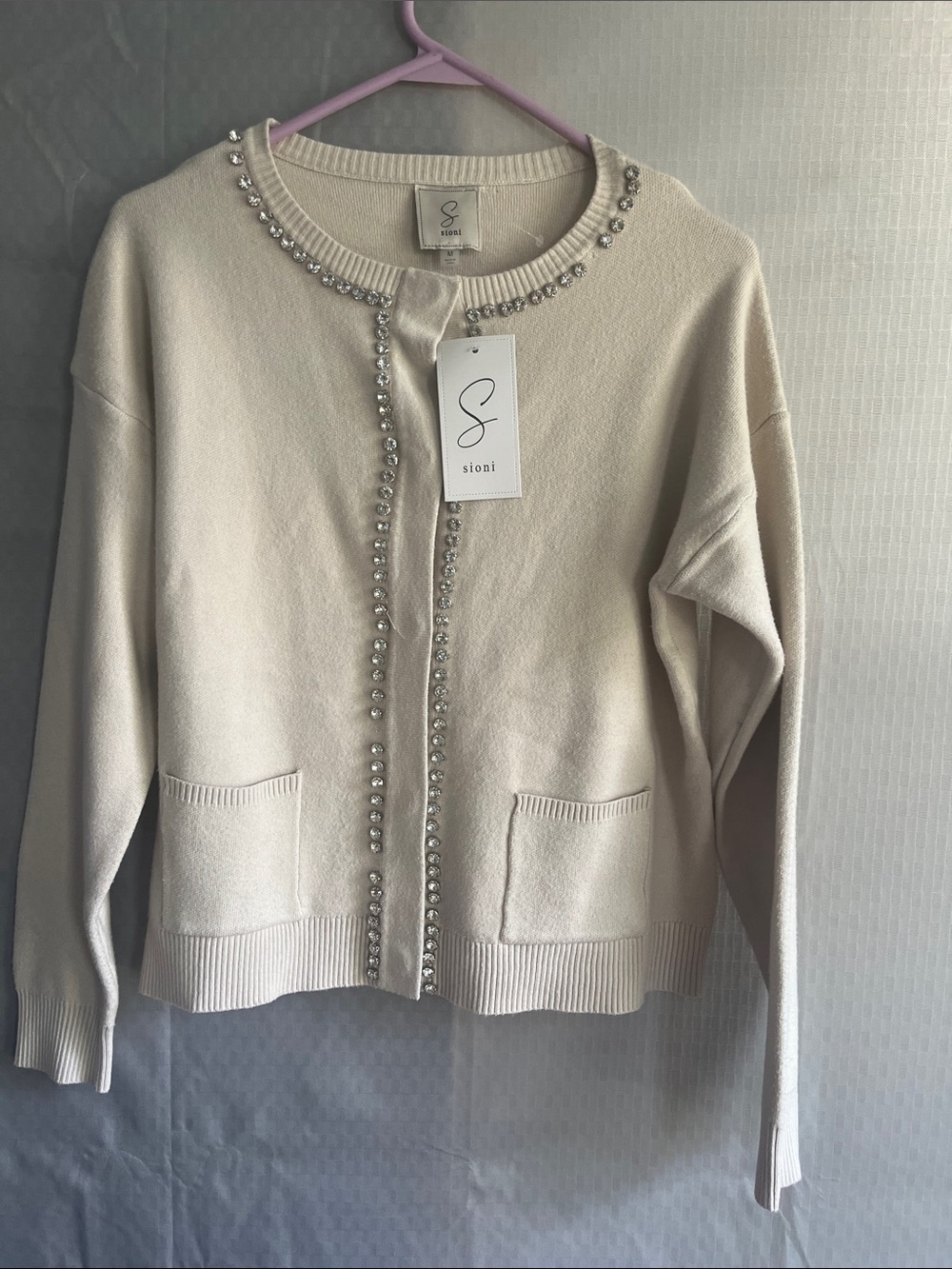 Cotton blend cardigan sweater 
89 th Madison with Cristal chain embellishment